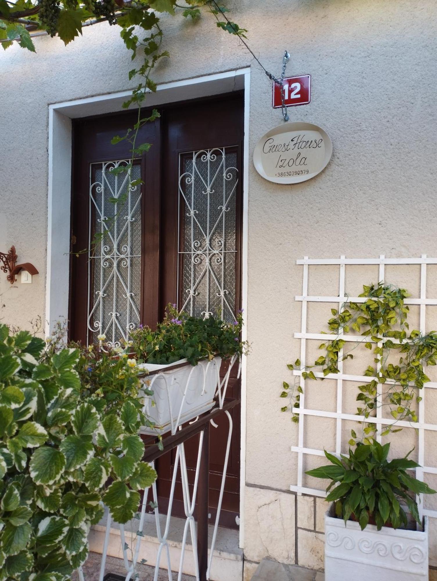 Guest House Izola Bagian luar foto
